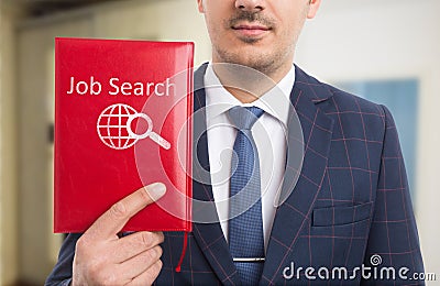 Man showing notebook with job search text and icon Stock Photo