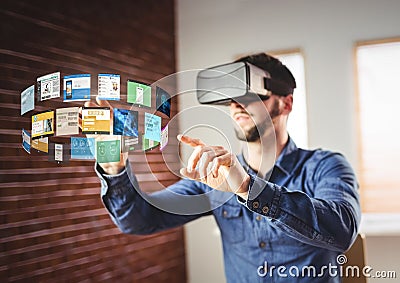 Man wearing VR Virtual Reality Headset with Interface Stock Photo