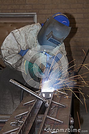 Man welding on production line Stock Photo