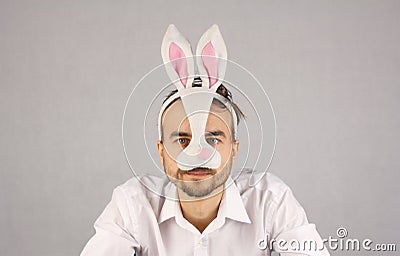 Man in the mask Easter rabbit looking at camera Stock Photo