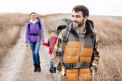 Man with wife and son backpacking Stock Photo