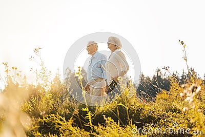 Man and woman, both seniors, embracing each other Stock Photo