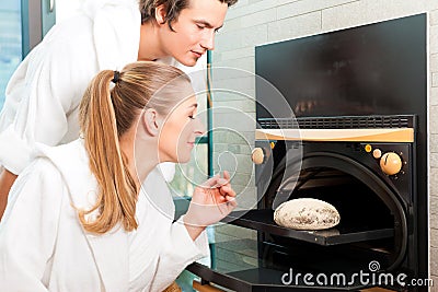 Man and woman in a bread sauna Stock Photo