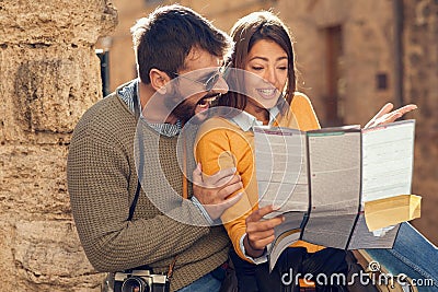 Man and woman Choose a destination at travel at Italy Stock Photo