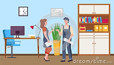 Man and woman colleagues chatting during work standing with paper sheets. People talk together Stock Photo