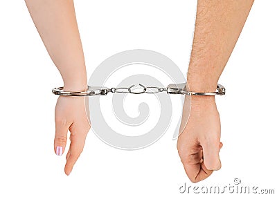 Man and woman hands and breaking handcuffs Stock Photo