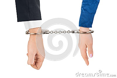 Man and woman hands and handcuffs Stock Photo