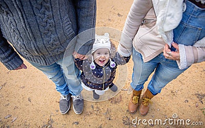 Man and woman holding hands of happiness little Stock Photo