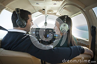 Man and woman in private plane Stock Photo