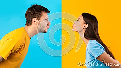 Man and woman reaching to each other trying to kiss Stock Photo
