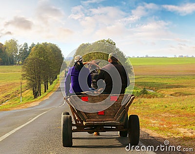 Man and woman riding in a carriage Editorial Stock Photo