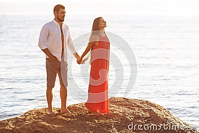 Man and woman stand on the stone Stock Photo