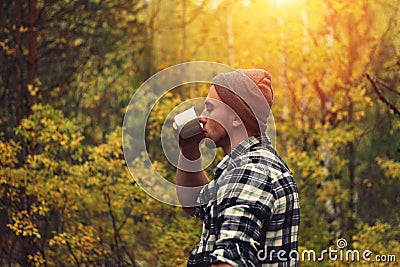 Man and woman at sunset makes a photo Stock Photo