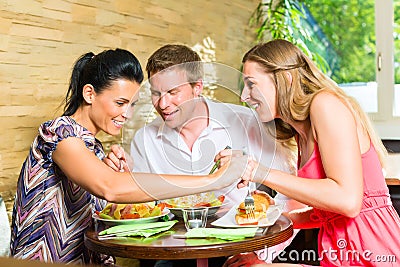 https://thumbs.dreamstime.com/x/man-women-eating-fresh-salad-breakfast-perhaps-colleagues-friends-together-healthy-lunch-taste-each-others-38767244.jpg
