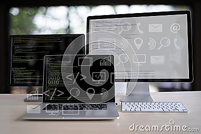 man work Coding software developer programmer is coding on a desktop computer Stock Photo