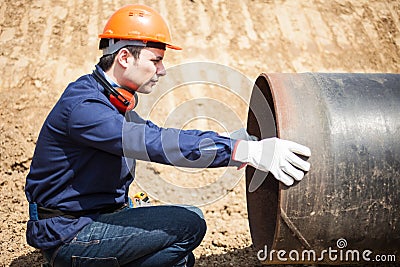 Man at work in a construction site Stock Photo
