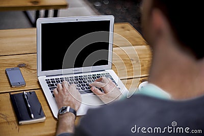 Man at work: Laptop Laptop and phone , home office Editorial Stock Photo