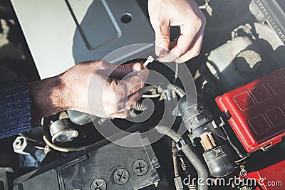 Man working in the car Stock Photo