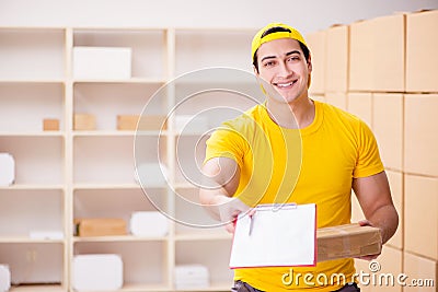 The man working in postal parcel delivery service office Stock Photo