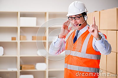 The man working in postal parcel delivery service office Stock Photo