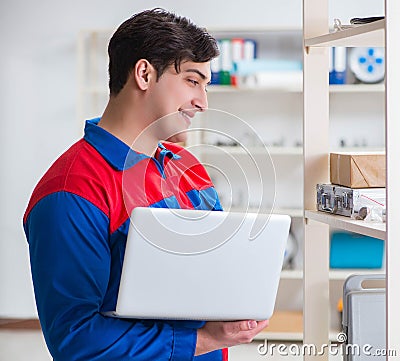 Man working in the postal warehouse Stock Photo