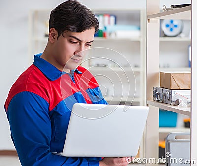 Man working in the postal warehouse Stock Photo