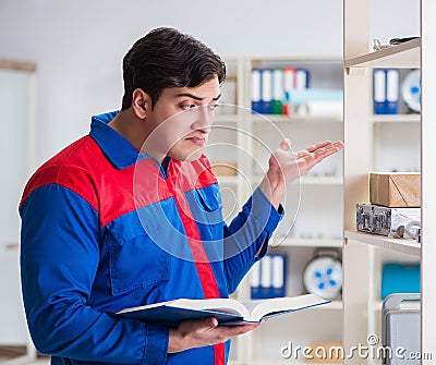 Man working in the postal warehouse Stock Photo