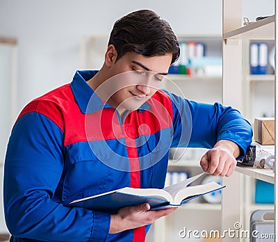 Man working in the postal warehouse Stock Photo