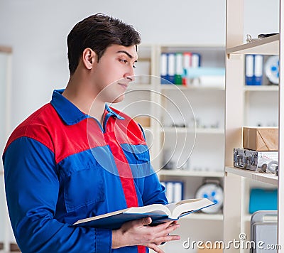 Man working in the postal warehouse Stock Photo