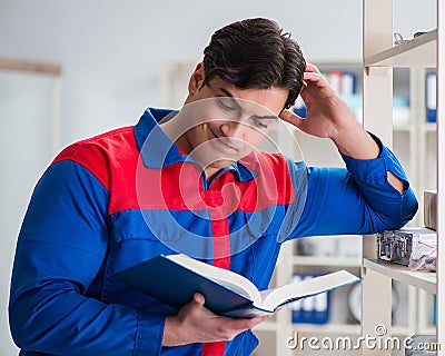 Man working in the postal warehouse Stock Photo