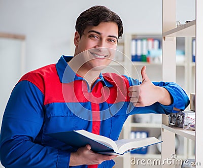 Man working in the postal warehouse Stock Photo