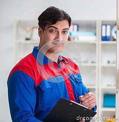 Man working in the postal warehouse Stock Photo