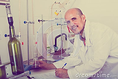 Man working with quality tests Stock Photo