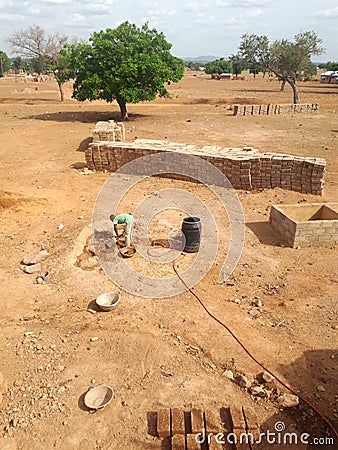 Building a house in the dry north of Ghana Editorial Stock Photo