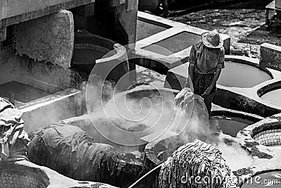 Man working in tanneries FÃ¨s Morocco Editorial Stock Photo