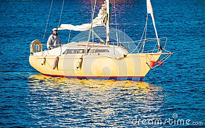 Man in yacht Stock Photo