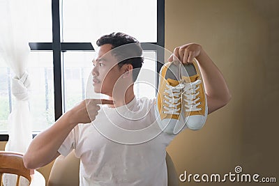 A man and yellow sneakers Stock Photo