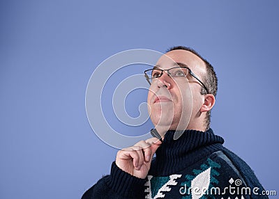 Man zipping up his sweater Stock Photo