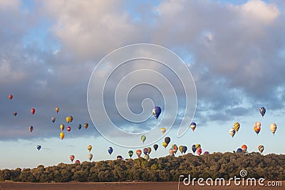 FAI European Hot Air Balloon Championship in Spain. Lots of hot air balloons in the air Editorial Stock Photo