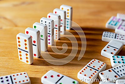 Management of business personnel. Symbol of strategy resources. Dominoes game planning for success. Stock Photo