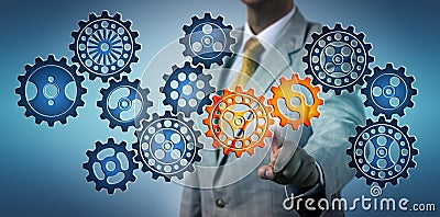 Manager Clicking Two Cogs In Virtual Gear Train Stock Photo