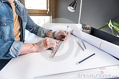 Manager creating new sketch at paper Stock Photo