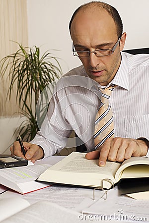 Manager at desk working Stock Photo