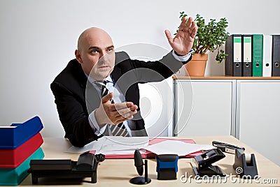 Manager explains with hectic gestures a situation Stock Photo