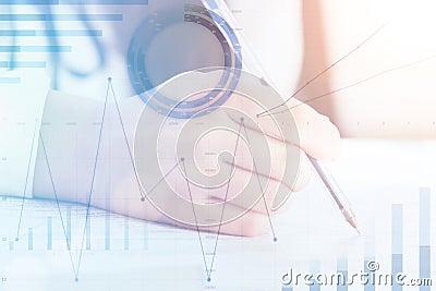 Manager finance business graph icon concept,businessman hand fills documents in office,signs contracts against the background of Stock Photo