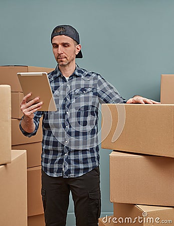 Manager monitoring packaging Stock Photo