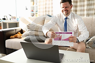 Manager without trousers sits home video conference Stock Photo