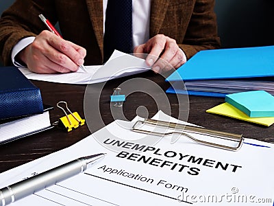 Manager and Unemployment benefits form Stock Photo