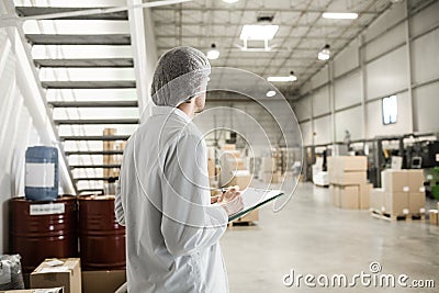 Manager working in automated production Stock Photo