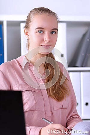 Manager writing financial report Stock Photo